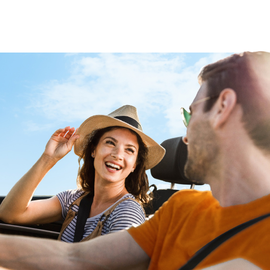 Couple driving in car