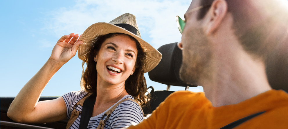 Girl holding keys to new car