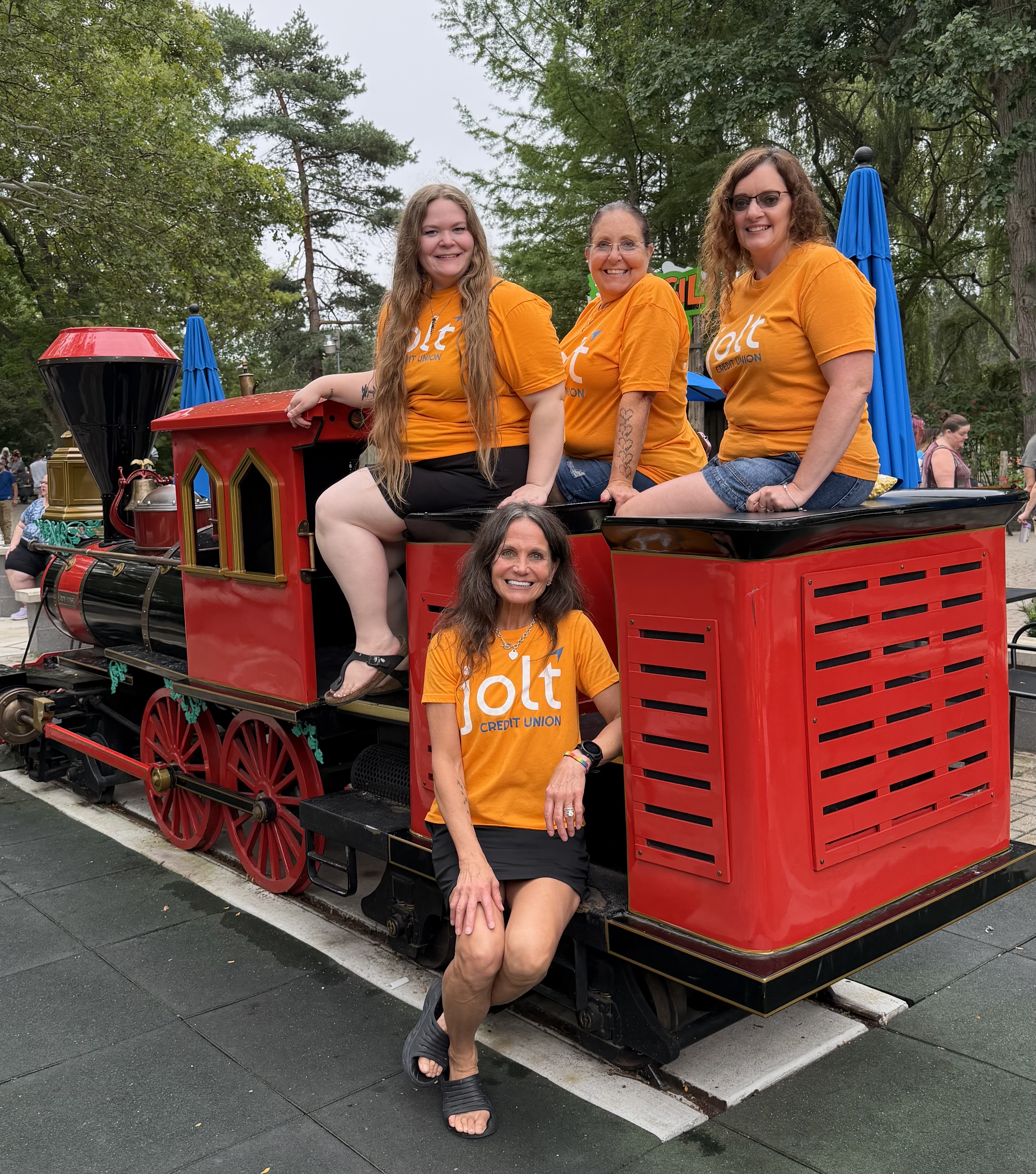 Jolt employees posing at the CU at the Zoo event presented by Impact Saginaw.