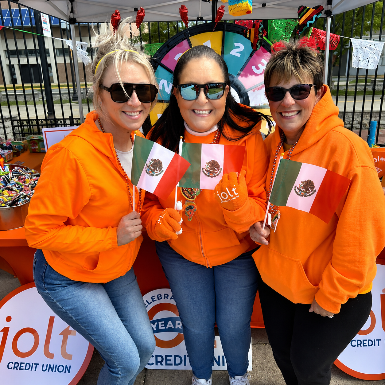 Jolt employees posing at the Cinco De Mayo festival in Saginaw