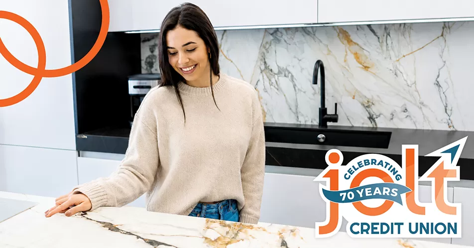 Woman looking at new kitchen countertops 