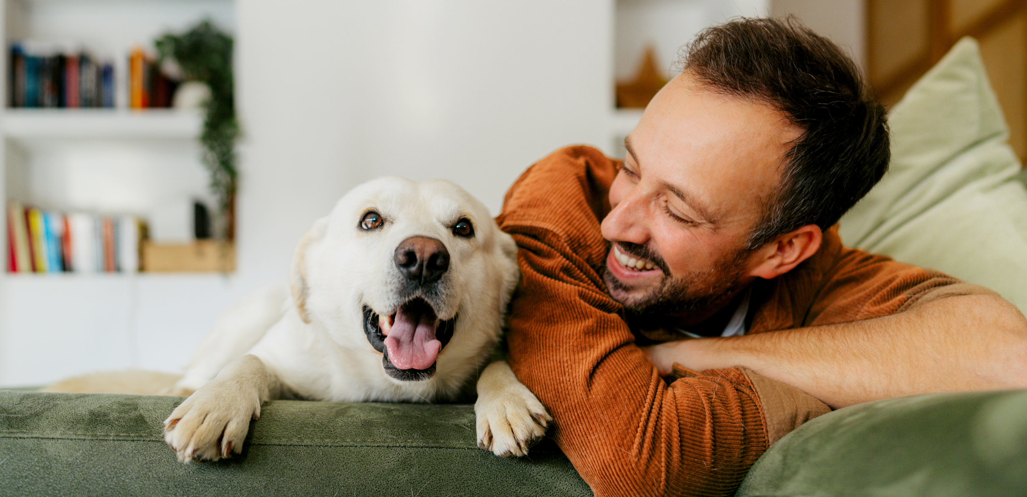 man sitting with dog